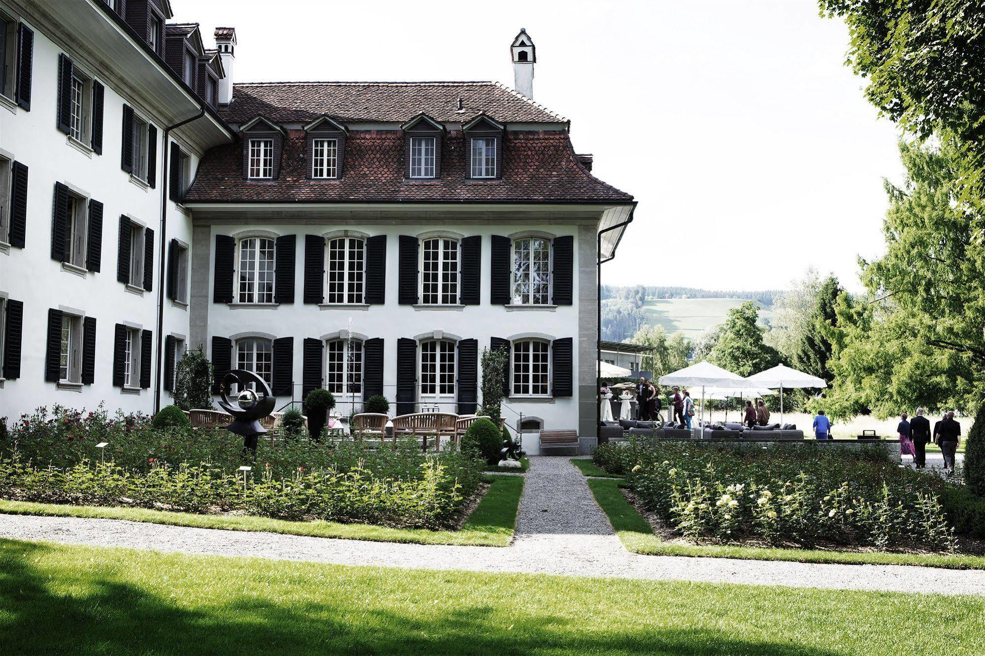 Hotel Schloss Huenigen Конольфинген Экстерьер фото